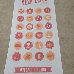 Elite 2014 White Beach Towel with Red and Yellow Icons